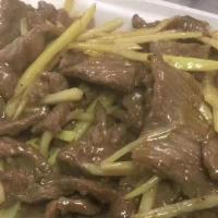 Ginger Beef · Sliced beef with shredded ginger in dry brown sauce.