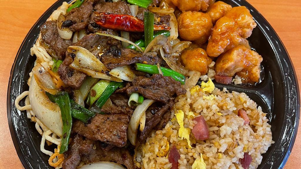 Mongolian Beef Comb · Mongolian Beef with fried rice, noodle, sweet & sour chicken.