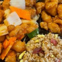 Sweet & Sour Pork Comb · Sweet & Sour Pork with fried rice, noodle, sweet & sour chicken.