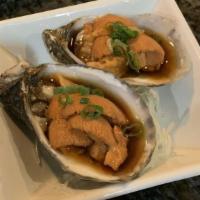 Oyster With Uni · Seasonal Oyster on it's shell with uni
Topped with ponzu and tabasco sauce