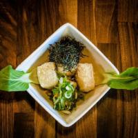Agedashi Tofu · Deep fried tofu with light savory sauce topped with seaweed, bok choy and green onion