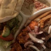 Combo Plate · Three pieces beef, three pieces chicken and one piece lule. Served with rice, fries, hummus ...