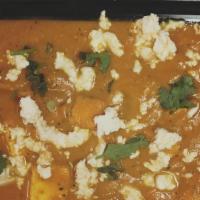 Shahi Paneer · Paneer cooked with creamy onion, tomato sauce, cashew paste and spices.