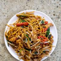 Mee Goreng · Indonesian Style pan fry egg noodle, scrambled egg, organic chicken, spinach, bean sprout, j...