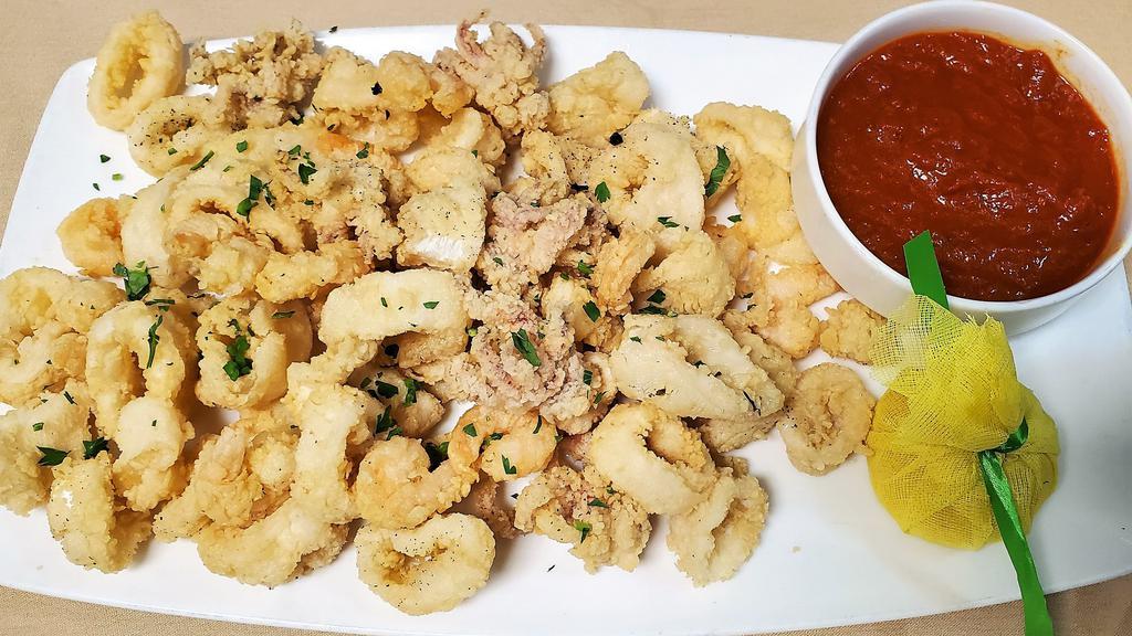 Fritto Di Calamari E Gamberetti · Deep-fried baby calamari and rock shrimp served with marinara sauce.
