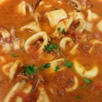 Calamari Alla Luciana · Baby calamari sautéed with garlic and white wine in a spicy tomato sauce.