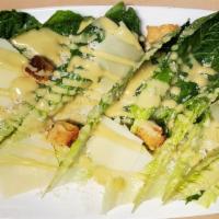 Insalata Di Cesare · Hearts of romaine with traditional Caesar dressing, croutons and shaved parmigiano. Add Mary...