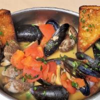 Brodetto Di Cozze E Vongole · Mussels and manila clams in a roasted garlic and chopped tomato white wine broth, served wit...