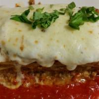 Lasagna · Fresh homemade pasta filled with bolognese and besciamella sauce then topped with mozzarella...