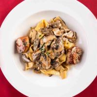 Pappardelle Con Funghi E Capesante · Homemade wide ribbon pasta with assorted field mushrooms and pan-seared diver scallops in a ...