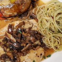 Pollo Al Marsala · Pan-seared breast of Mary's free range chicken sautéed with mushrooms and marsala wine. Serv...