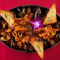 Cioppino · Fresh seasonal mussels, manila clams, jumbo prawns, calamari, diver scallop and catch of the...