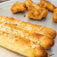Garlic Breadsticks (3 Pieces) · Comes with Marinara sauce dipping