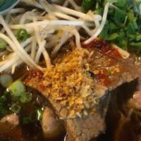 Flavor-Pho (Thai Style) · Slightly darker beef broth, with house made sweet, sour, chili sauce and fried garlic. Rare ...