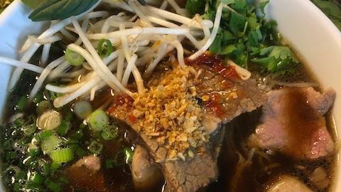 Flavor-Pho (Thai Style) · Slightly darker beef broth, with house made sweet, sour, chili sauce and fried garlic. Rare steak, brisket, and beef meatballs, toppings include bean sprouts, green onions, cilantro, yellow onions, and basil.