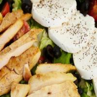 Caprese Mozzarella With Chicken Salad · Mixed greens, grilled chicken, fresh Caprese mozzarella, cucumbers, tomatoes, and black oliv...