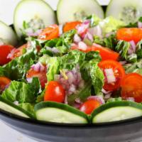 Green Salad · Mixed greens, romaine, cucumbers, Cherry tomatoes, red onions and black olives.