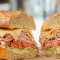 The Babe House Made Turkey · Housemade  turkey, provolone cheese, lettuce, tomatoes and mayo.