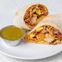 Breakfast Burrito · Scrambled eggs, tater tots, cheddar and jack cheese, and choice of ham, bacon, sausage, chor...