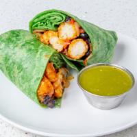 Vegan Burrito · Black beans, tater tots, onion, roasted bell pepper, tomato and scallions in a flour tortill...