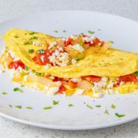 Mediterranean Omelet · Three eggs, feta cheese, roasted bell peppers, tomato, scallions, onion.