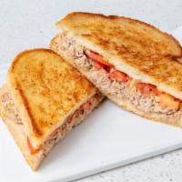 Tuna Melt · House tuna salad, grilled tomatoes, melted provolone cheese, grilled sourdough bread