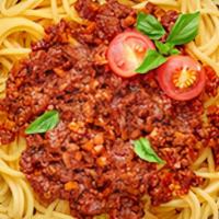 Spaghetti With Meat Sauce · Spaghetti cooked al dente served with house made meat sauce and delicious partigiano Reggian...