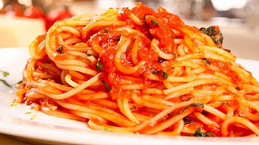 Spaghetti With Italian Sausage · Fresh spaghetti with Italian Sausage served with red sauce, red pepper flakes, and parmesan. Served with garlic bread.