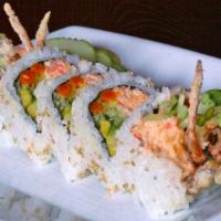 Spider Roll  6Pcs · Inside: deep fried soft shell crab, cucumber, avocado, gobo root, and radish sprout. Outside...