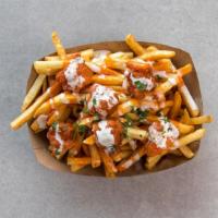 Buffalo Fries · topped with crispy buffalo chicken, drizzled with buffalo sauce and ranch dressing.