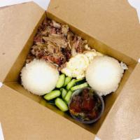 Kalua Style Pulled Pork · Pulled pork over rice.  Includes cucumbers, mac salad, and 1 choice of protein.