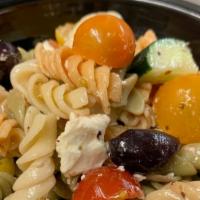 Pasta Salad · Curly pasta with grape tomatoes, cucumbers, Kalamata olives feta cheese, and Italian dressing