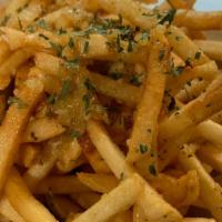 Garlic Fries · Minced garic parsley and fresh parmesan cheese mixed with fries.