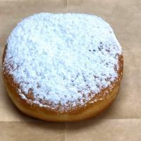 Nutella Overload · Yeast donut stuffed with Nutella and sprinkled with powdered sugar.