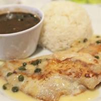Filete De Chillo · grilled red snapper fillet topped with garlic lemon butter sauce