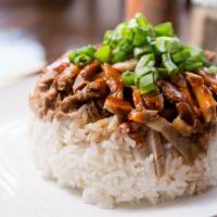 Chashu Don · Tender chashu pork over rice with special soy sauce and spicy sauce.