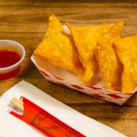 Cheese Wontons · Fried cream cheese wontons with a little bit of imitation crab. (Price varies depending on t...
