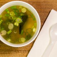 Miso Soup · Comes with tofu (optionals: seaweed and green onions).