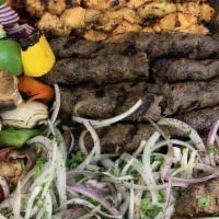 Family Meal One Pound Shawerma  ,Beef Or Chicken Or Mix · CHOICE OF MEAT, HUMMUS ,RICE ,CABBAGE SALAD ,PICKLES  ,CHOICE OF GARLIC OR TAHINI AND 6 PITA...