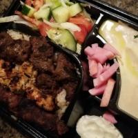 Mixed Kabob Plate · Ground beef kabob, chicken kabob and shish kabob served with french fries or rice, salad, hu...