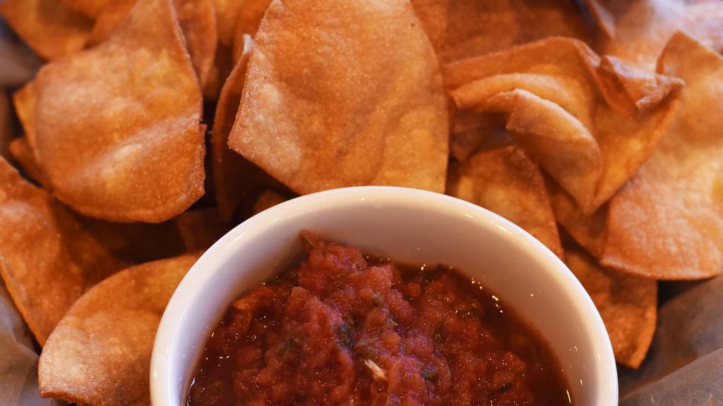 Chips & Salsa · House fried white corn tortilla chips served with fresh salsa.