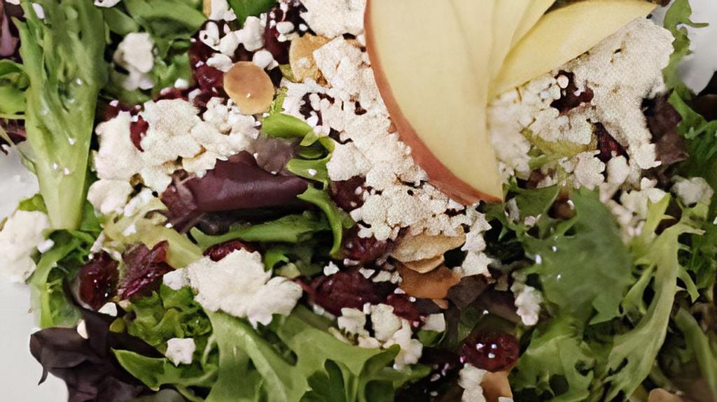 Apple Balsamic · Spring mix tossed in balsamic vinaigrette with goat cheese, toasted almonds & dried cranberries. Topped with crisp Fuji apple slices.