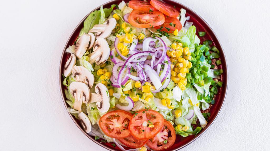 House Salad · Lettuce, tomato, corn, mushroom, cheese (choice of Thousand island, ranch, oil and vinegar, or lemon juice).