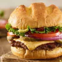 Classic Smash® Burger  · Certified Angus Beef, American cheese, lettuce, tomatoes, red onions, pickles, Smash Sauce®,...