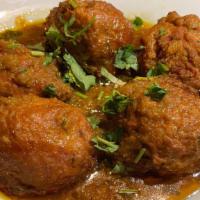 Beef Kofta Curry · Beef meat balls cooked with spices in a traditional curry