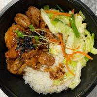 Spicy Chicken Bulgogi Rice Bowl · Spicy chicken over rice and vegetables.