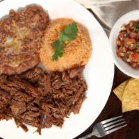 Birria De Res · Beef birria served with rice, beans eight oz. consome and three hand made tortillas.