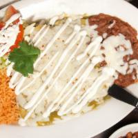 Cheese Enchiladas (Red Or Green Sauce) · Three enchiladas your choice of Green or Red Sauce served with rice, beans, and a small port...