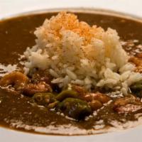 Seafood Gumbo · A great blend of gulf shrimp and crabmeat in a rich dark roux.