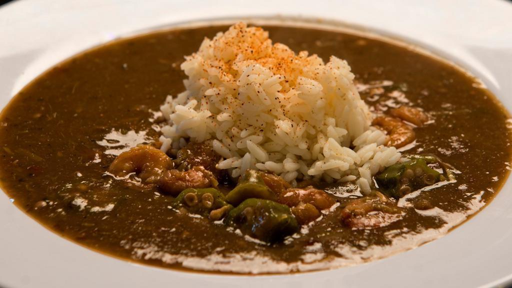 Seafood Gumbo Bowl · A great blend of gulf shrimp and crab meat, in a rich dark roux.